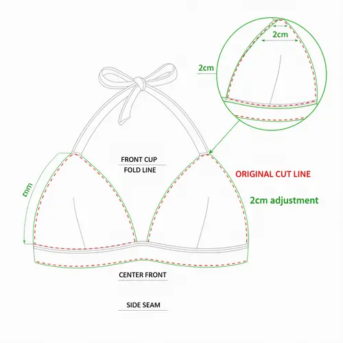 Diagramma tecnico del cartamodello che mostra un aggiustamento della curva sotto l'ascella di 2 cm su un cartamodello di top bikini con linee di taglio originali e modificate